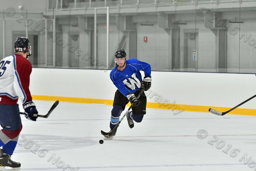 Wheaton College Men\'s Ice Hockey vs Middlesex Community College. - Photo By: KEITH NORDSTROM